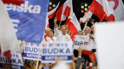 Leader of main opposition party Civic Platform (PO) Donald Tusk (C) shows a Victory sign during the Civic Platform party meeting with local residents in Katowice, Poland