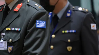 NATO soldiers with image of two soldiers from two different countries.