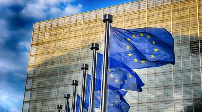 EU flags in front of European Commission in Brussels