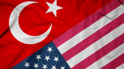 US flag sitting next to turkish flag