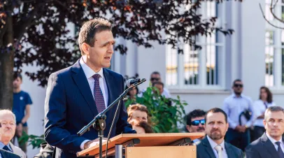 Slovakian Progressive leader Ľudovít Ódor speaking at a podium