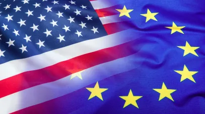 Flags of the USA and the European Union.