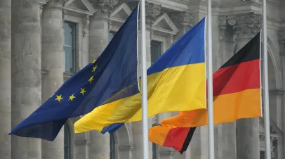 Germany Ukraine and EU flags flying next to one anotjher