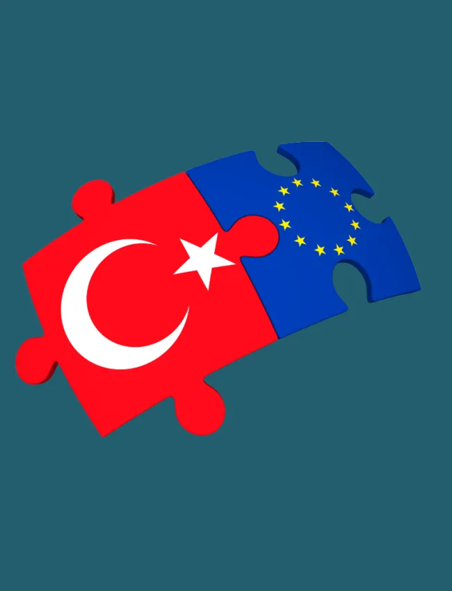 Two puzzle piece graphics, one with the Turkish flag and one with the EU flag on it